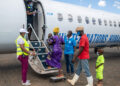 Refugees from Burundi prepare to board a flight back home in December 2020. © UNHCR/Samuel Otieno